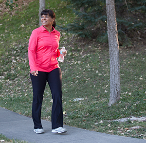 Woman walking outdoors.